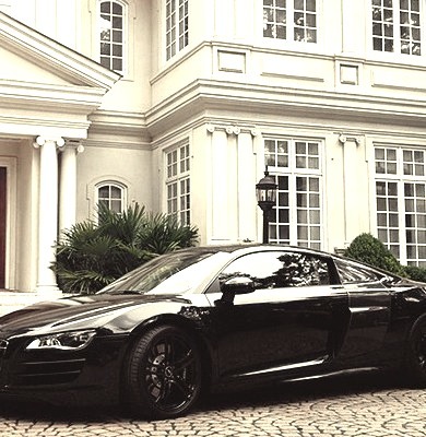 Audi Outside of Mansion